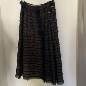 NWT Amelia Toro skirt rare find shear black chiffon type overlay nude lining.